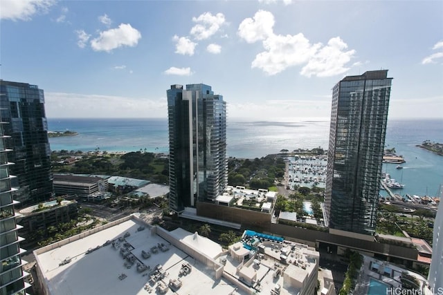 property's view of city with a water view