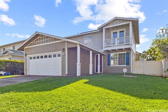 front of property featuring a front lawn, a garage, and a balcony