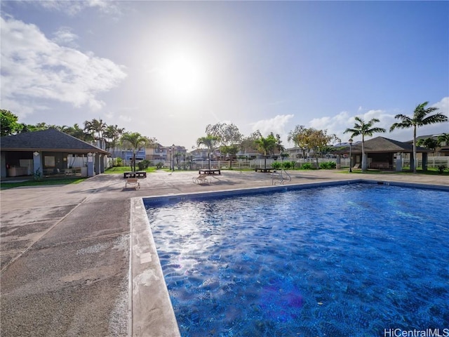 view of swimming pool featuring a gazebo and a patio