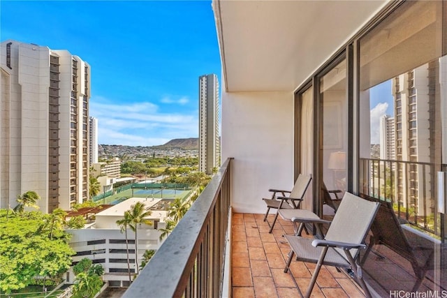 balcony featuring a mountain view