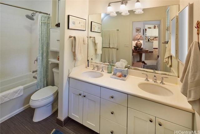 full bathroom featuring toilet, vanity, and shower / bathtub combination with curtain