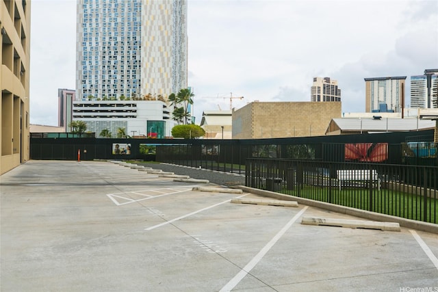 987 Queen St Unit 1401, Honolulu, HI 96814 - uncovered parking lot with a view of city
