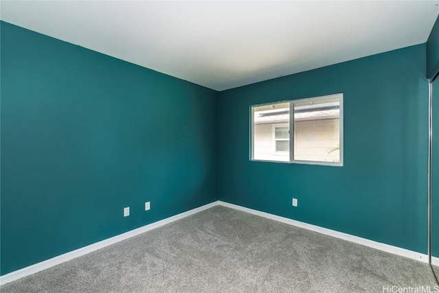 empty room with carpet floors