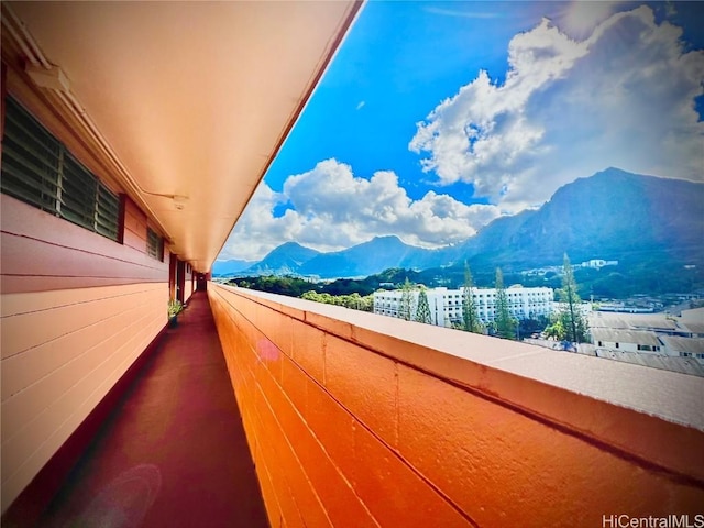 balcony featuring a mountain view