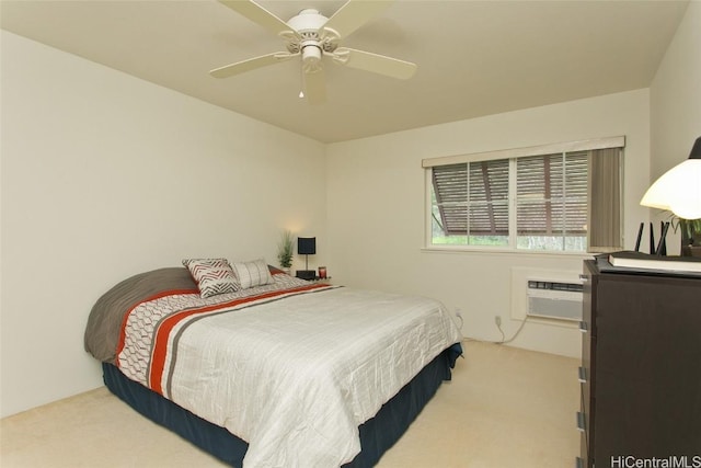 bedroom featuring carpet, an AC wall unit, and ceiling fan