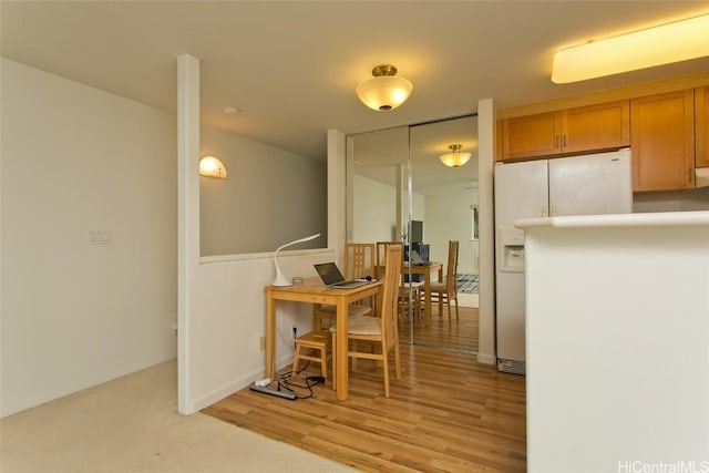 dining space featuring light hardwood / wood-style floors