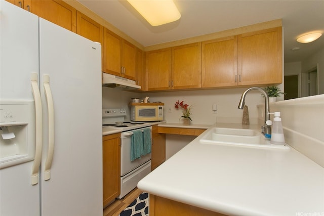 7128 Hawaii Kai Dr Unit 97, Honolulu, HI 96825 - kitchen featuring white appliances, under cabinet range hood, a sink, and light countertops