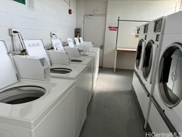 washroom featuring independent washer and dryer