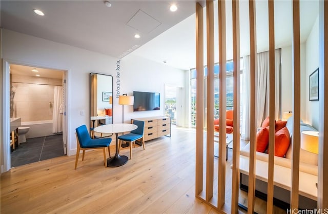 sitting room with light hardwood / wood-style flooring