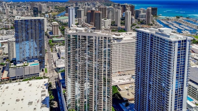 birds eye view of property with a water view