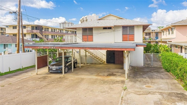 view of front facade with a carport