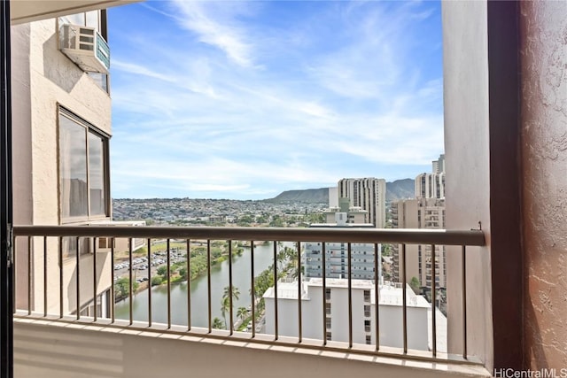 balcony with a water and mountain view