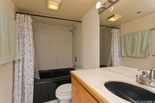 full bathroom with shower / bath combination with curtain, vanity, and toilet