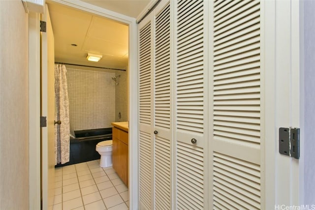 hallway with light tile patterned floors