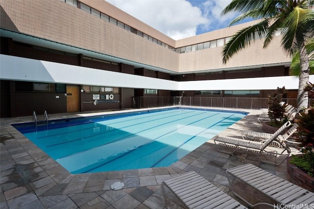 view of pool featuring a patio