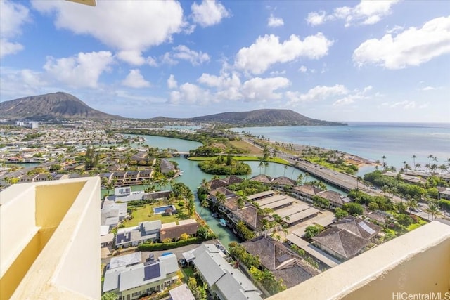 aerial view featuring a water and mountain view