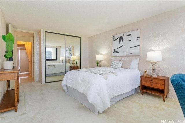 carpeted bedroom featuring a closet