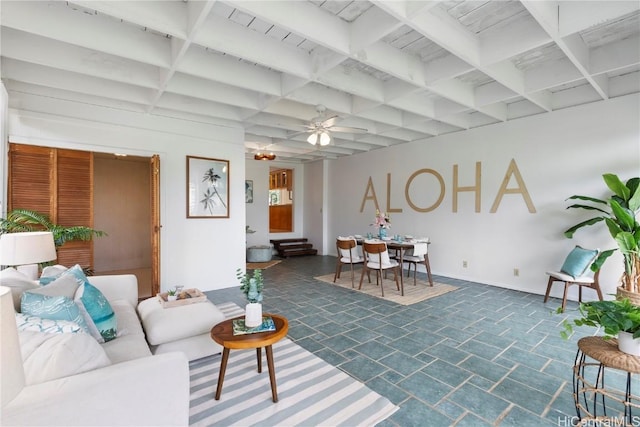 living room with coffered ceiling, beam ceiling, and ceiling fan