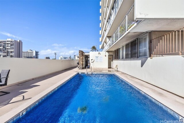 view of pool with a patio