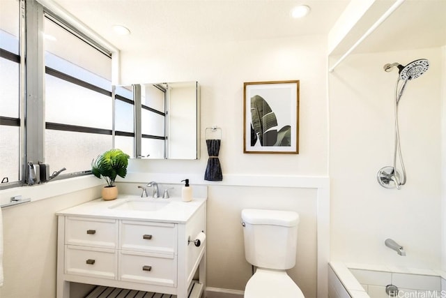 full bathroom with vanity,  shower combination, and toilet