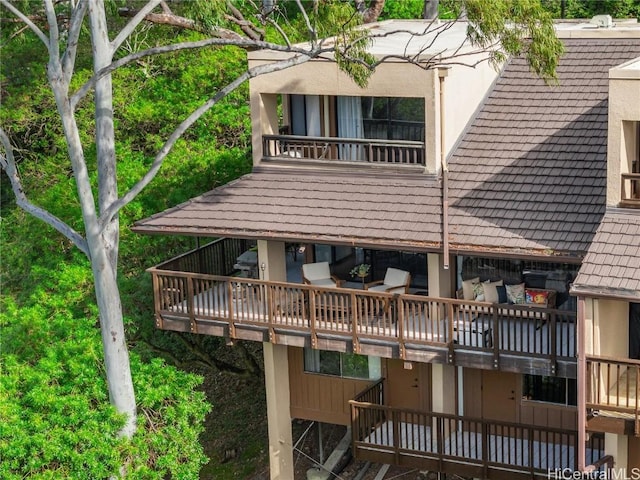 exterior space featuring a balcony