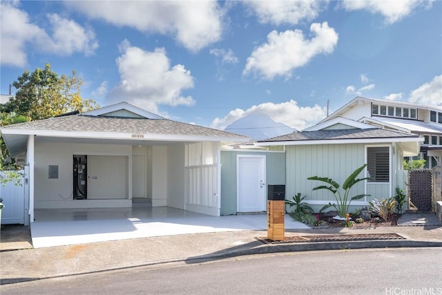 view of front of property with a carport