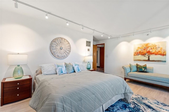 bedroom featuring light hardwood / wood-style floors