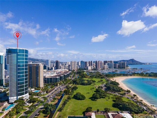 bird's eye view with a view of the beach and a water view