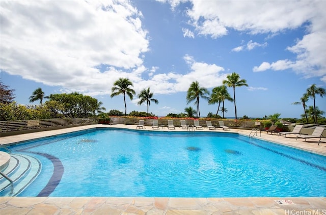 view of swimming pool featuring a patio area