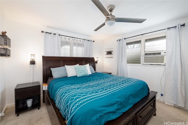 bedroom with cooling unit, ceiling fan, and light colored carpet