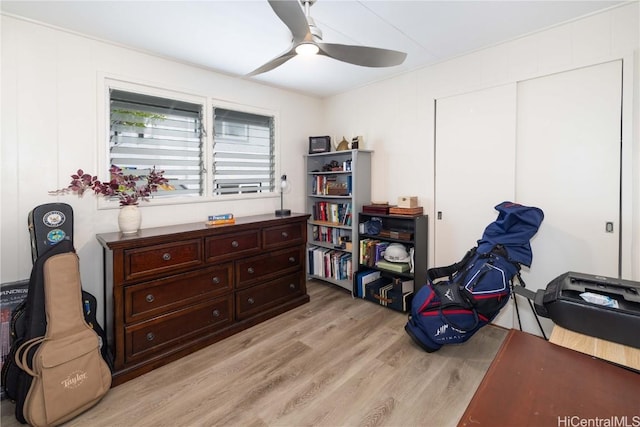 miscellaneous room featuring light wood-type flooring and ceiling fan