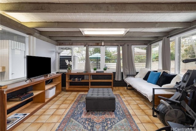 tiled living room featuring beam ceiling