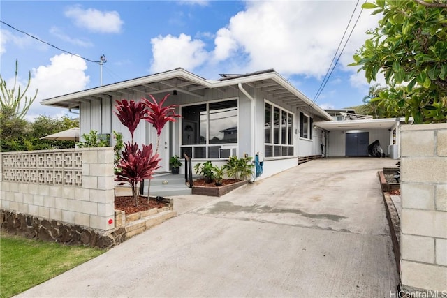 view of front of house featuring a carport