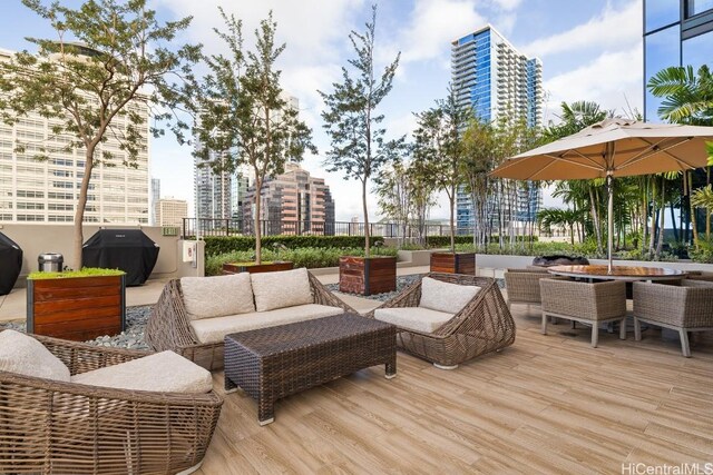 view of patio / terrace with an outdoor hangout area and grilling area