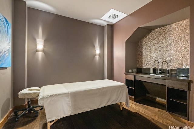 bathroom featuring wood-type flooring