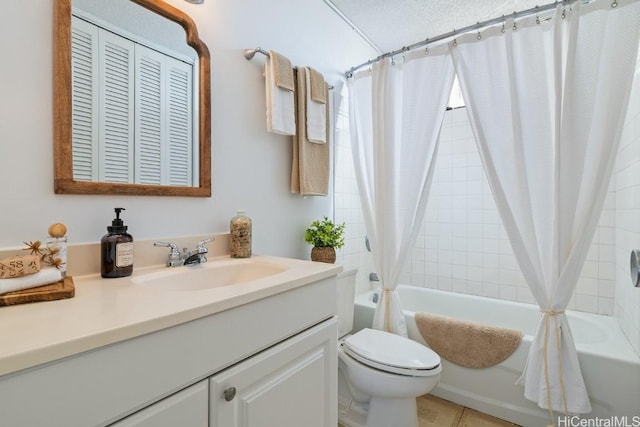 full bathroom featuring vanity, shower / tub combo, and toilet