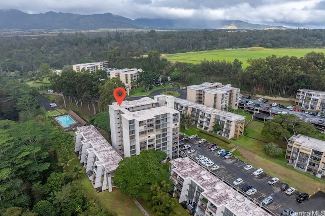 birds eye view of property featuring a mountain view