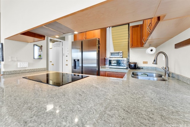 kitchen featuring stainless steel appliances and sink