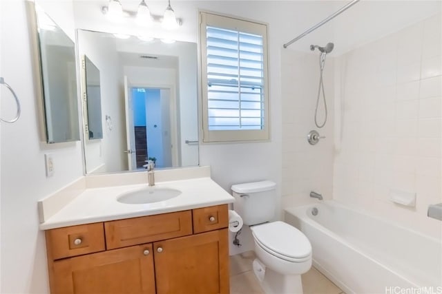 full bathroom featuring tile patterned flooring, vanity, shower / bath combination, and toilet