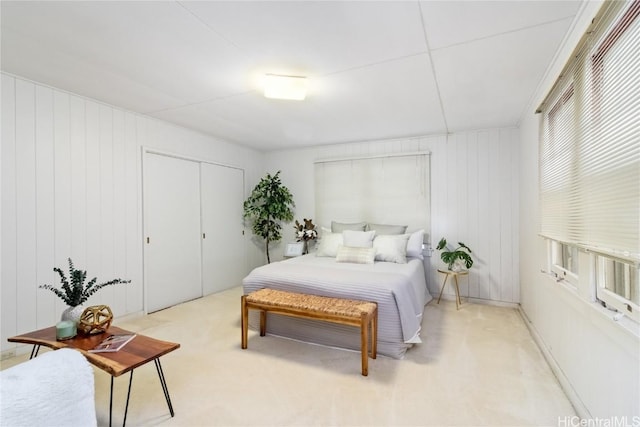 carpeted bedroom with a closet