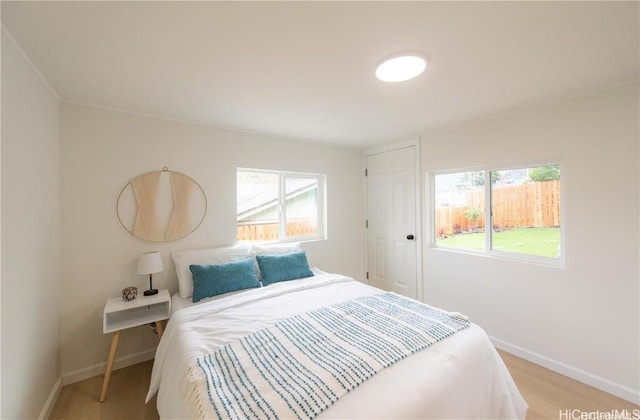 bedroom featuring light wood-type flooring