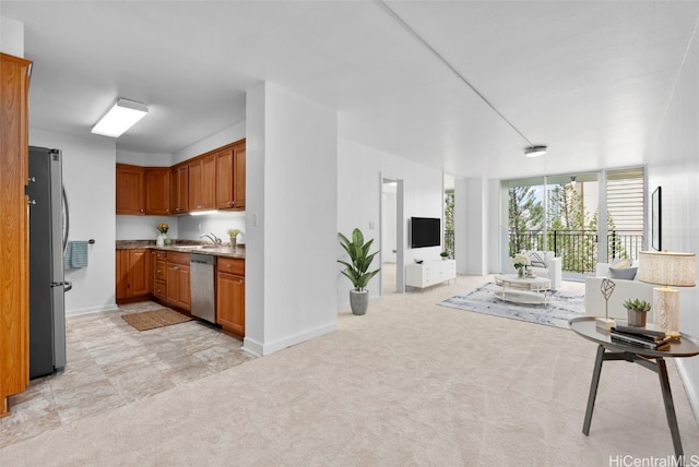 living room featuring baseboards and light carpet