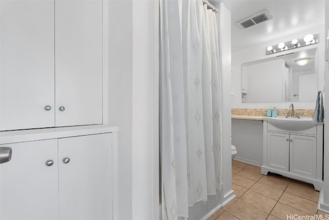 full bathroom with visible vents, toilet, a shower with shower curtain, tile patterned flooring, and vanity