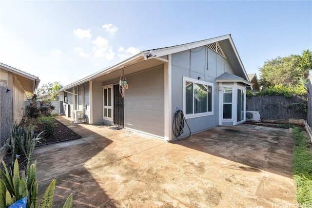 back of property featuring a patio