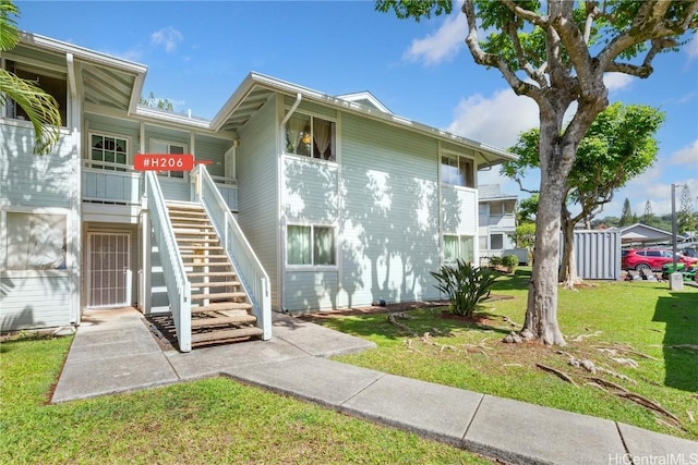 exterior space with a front yard