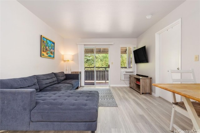 living room with light hardwood / wood-style flooring