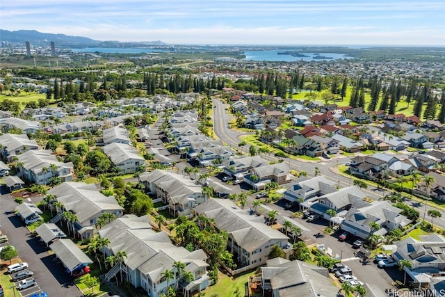 drone / aerial view with a water and mountain view