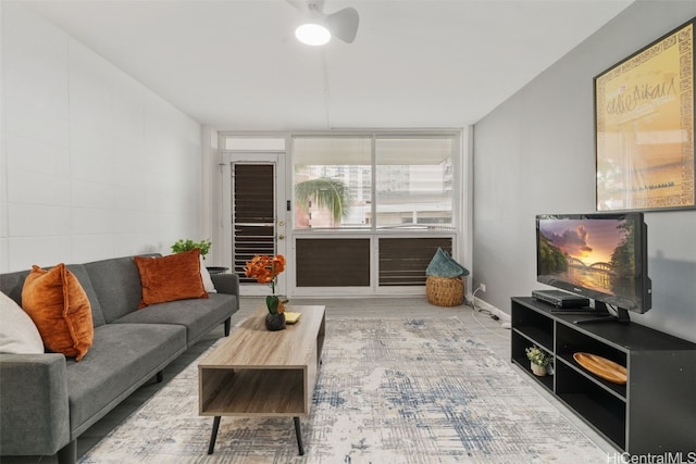 living room featuring ceiling fan