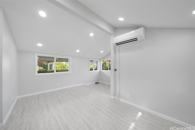 interior space featuring light hardwood / wood-style floors and a wall mounted AC