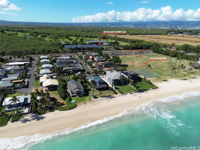 aerial view featuring a water view and a beach view